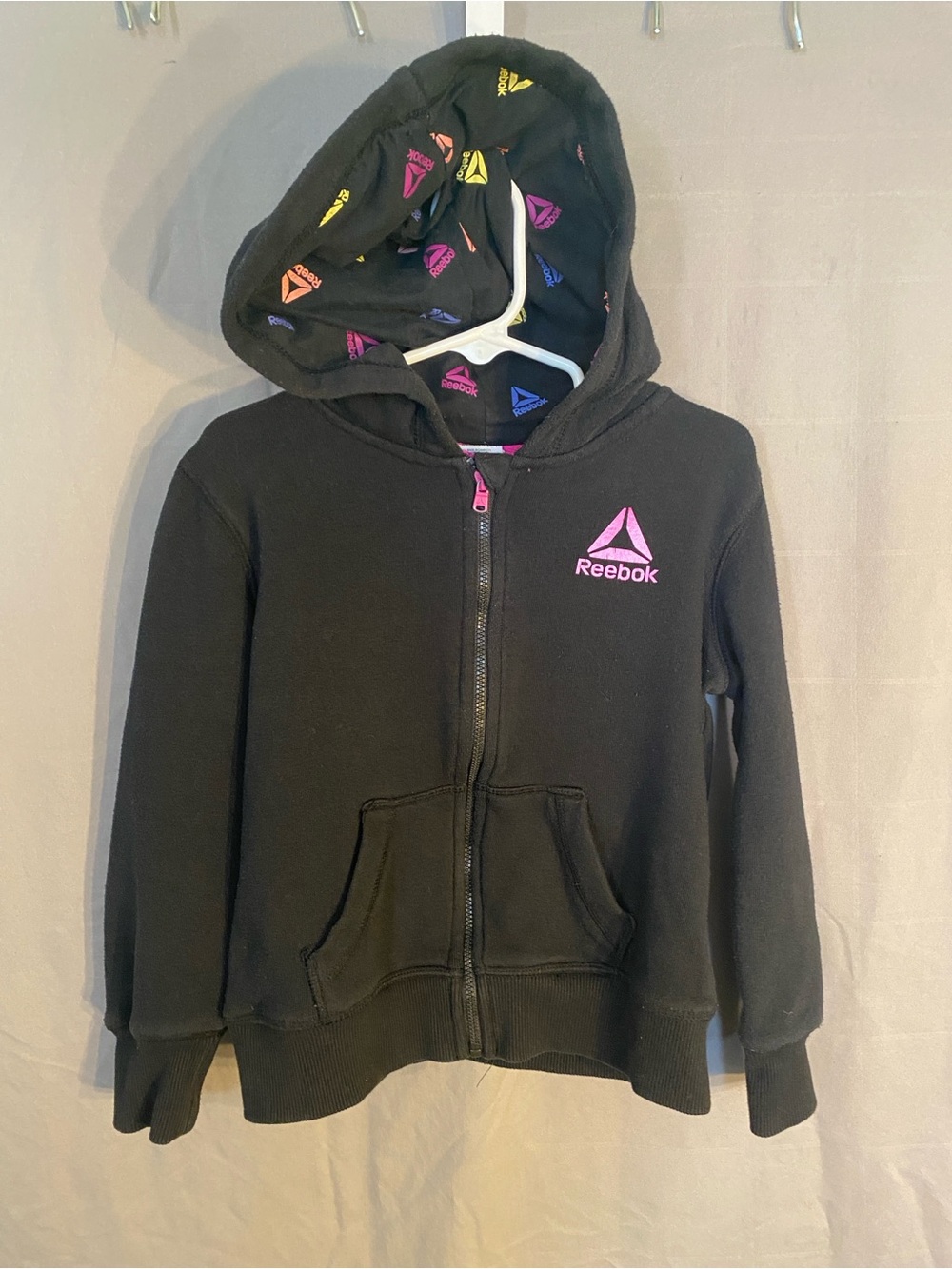Reebok Black Zip-Up Hoodie with Pink Logo and Multicolor Hood Lining